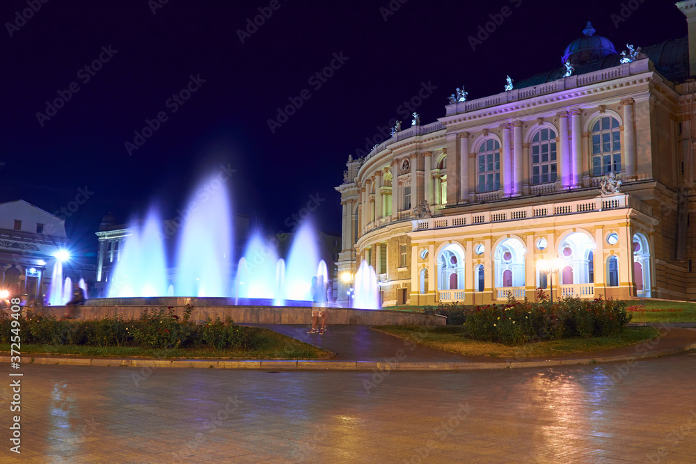 Fototapeta premium night view of Opera house in Odessa city, Ukraine. Beautiful city Park and street illumination