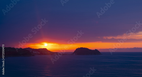 Island of San Anton and Cantabrian Sea at sunset in Getaria  Basque Country