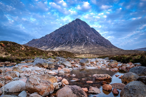 the iconic Buachaille Etive Mor under blue skies.
