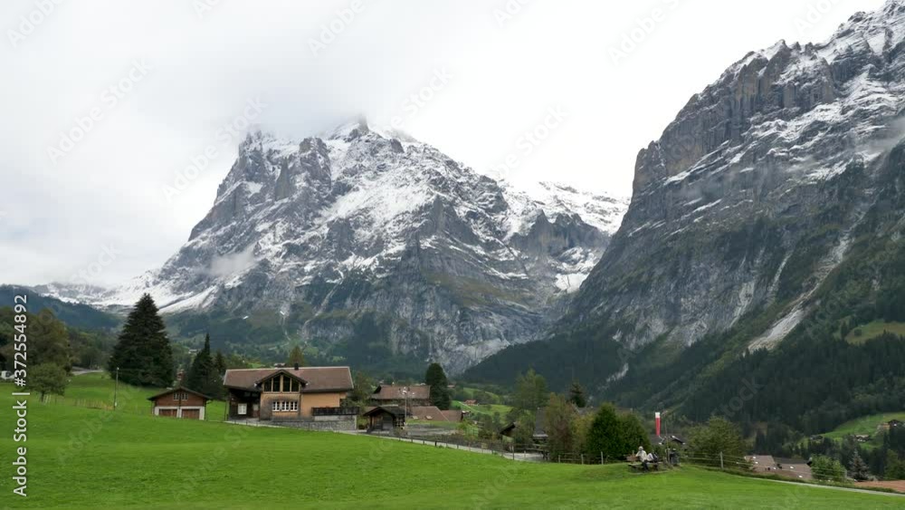 Pan Shot of Mittelhorn Swiss Alps Mountain Background, Grindelwald Switzerland Pan Shot of Mittelhorn Swiss Alps Mountain Background, Grindelwald Switzerland