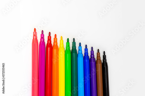 Color colored markers isolated on white background close up. Drawing colored felt pen