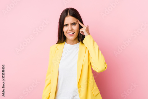 Young business woman showing a disappointment gesture with forefinger. © Asier