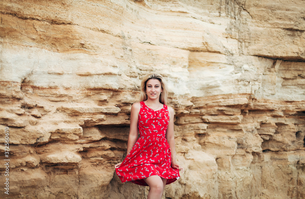 portrait of a blonde near the rocks
portrait of a blonde near the rocks