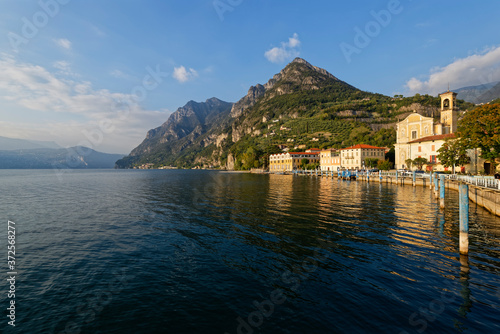 Italy, Lombardy, Marone, Lake Iseo with Corna Trentapassi mountain photo