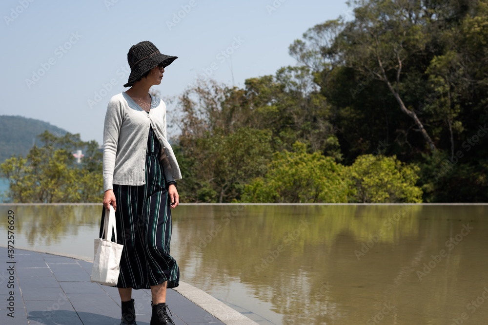 traveling woman walk at Xiangshan Visitor Center