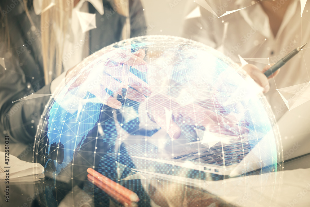 Double exposure of man and woman working together and financial theme hologram. international business concept. Computer background. Double exposure of man and woman working together and financial theme hologram. international business concept. Computer background.