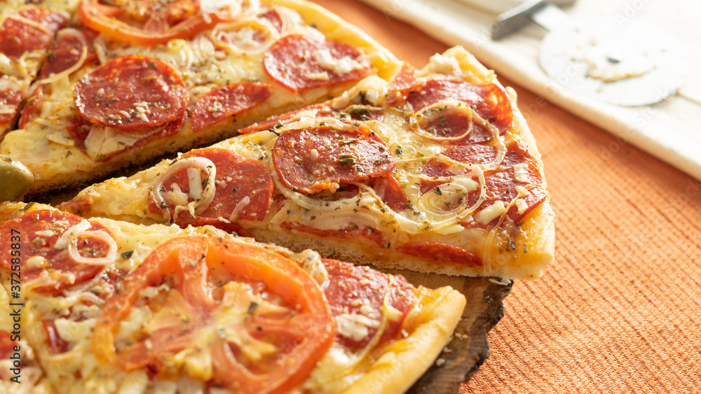 pizza with salami and cheese pizza with salami and cheese