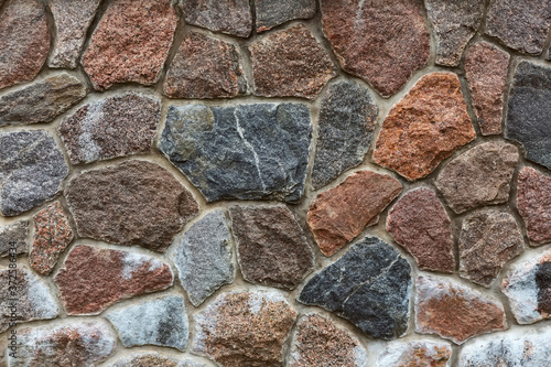 Natural stone wall materials in classic building patterns  texture samples and background