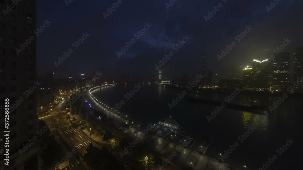 Night to day timelapse over the Huangpu river in Shanghai Night to day timelapse over the Huangpu river in Shanghai