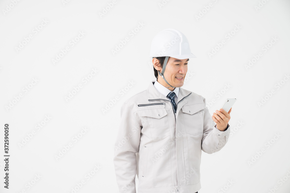 ビジネスマン 作業服 スマホ ビジネスマン 作業服 スマホ