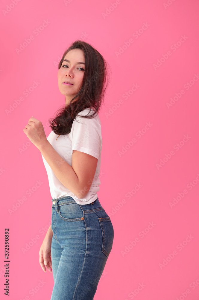Woman young asian smiling joyfully giving the camera on Pink background Woman young asian smiling joyfully giving the camera on Pink background