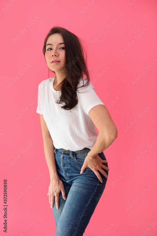 Woman young asian smiling joyfully giving the camera on Pink background Woman young asian smiling joyfully giving the camera on Pink background