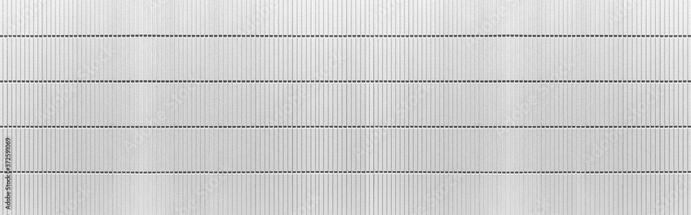 Naklejka premium Panorama of Modern white stone wall with stripes texture and seamless background