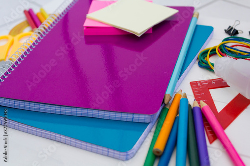 School supplies on white wooden table