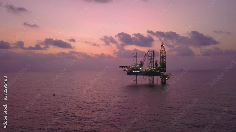 Aerial view from a drone of an offshore jack up rig at the offshore location during sunrise time
Aerial view from a drone of an offshore jack up rig at the offshore location during sunrise time