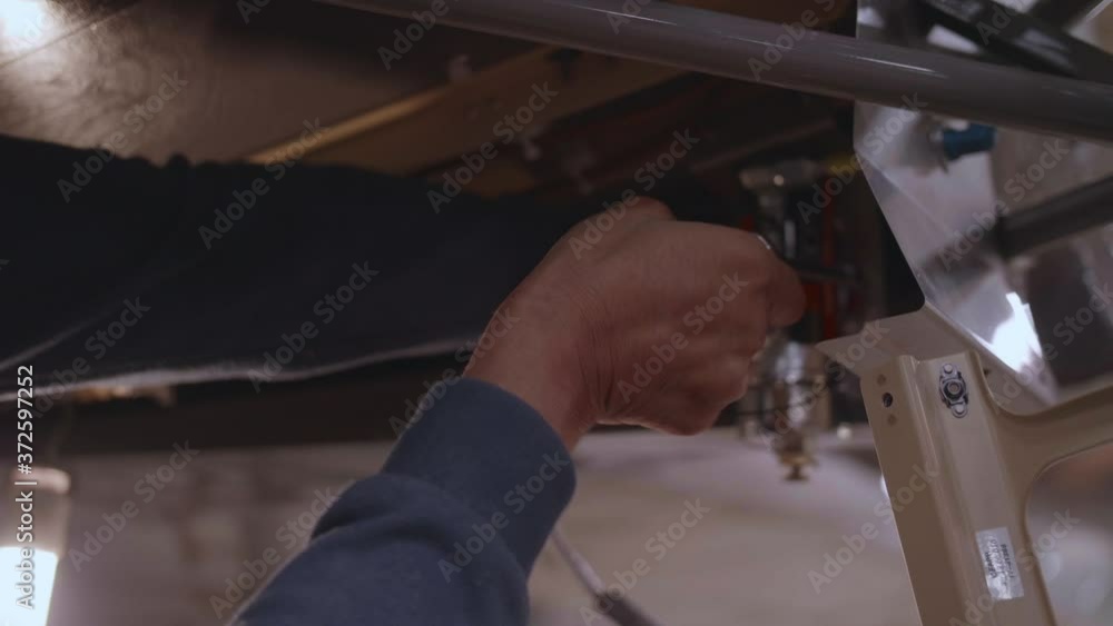 Worker screwing something, slowmotion, 1 Worker screwing something, slowmotion, 1