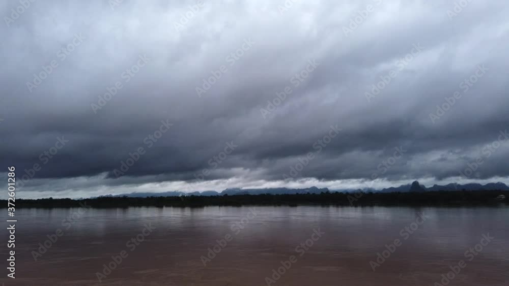 Cloudy day over border Thailand and Laos ,Mekong River are rise by rain and Dam in China release some water to the river. Cloudy day over border Thailand and Laos ,Mekong River are rise by rain and Dam in China release some water to the river.