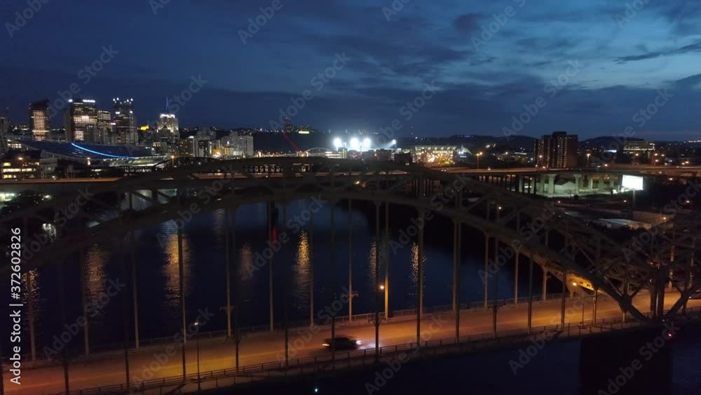 Downtown Pittsburgh Illuminated City Skyline PPG Building at Night Aerial with Water Reflection 4K Downtown Pittsburgh Illuminated City Skyline PPG Building at Night Aerial with Water Reflection 4K