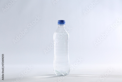 Plastic bottle of pure water isolated on white