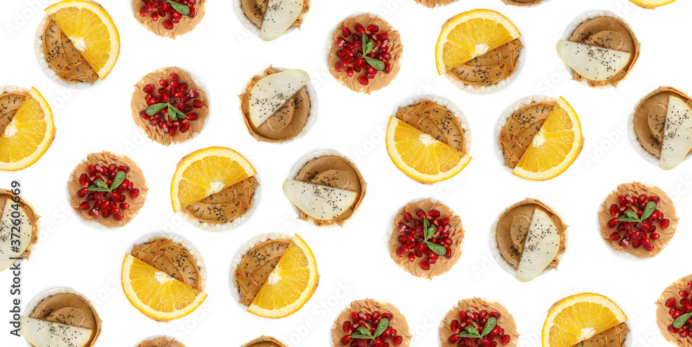 Set of puffed corn cakes with peanut butter on white background, top view. Pattern banner design Set of puffed corn cakes with peanut butter on white background, top view. Pattern banner design