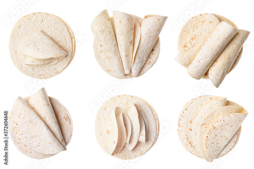 Set of corn tortillas on white background, top view photo