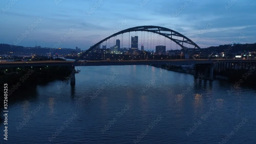 Downtown Pittsburgh Illuminated City Skyline PPG Building at Night Aerial with Water Reflection 4K Downtown Pittsburgh Illuminated City Skyline PPG Building at Night Aerial with Water Reflection 4K
