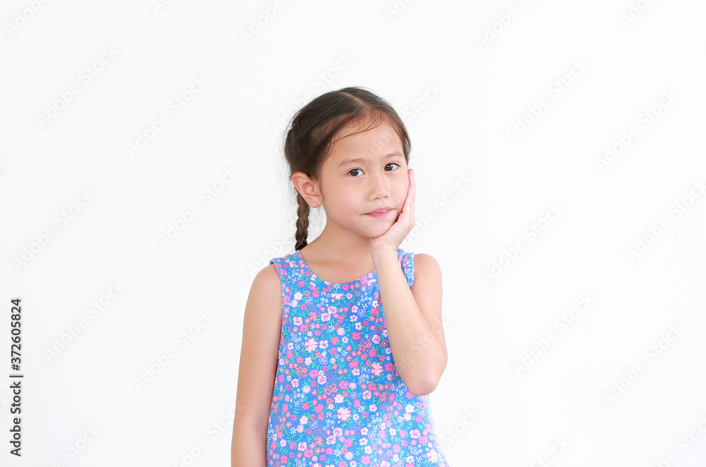 Portrait of asian little child girl touching hand on chin and cheek isolated on white background with looking at camera. Portrait of asian little child girl touching hand on chin and cheek isolated on white background with looking at camera.