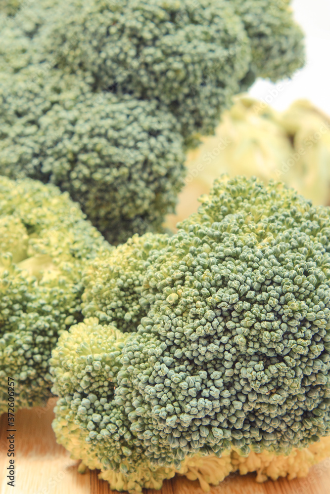 Fresh green broccoli containing vitamins and minerals. Healthy eating Fresh green broccoli containing vitamins and minerals. Healthy eating