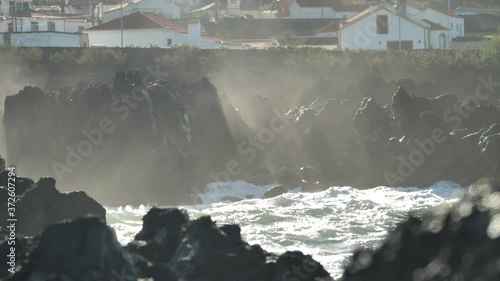 Sun Rays Shine Through Mist At Volcanic Lava Rocks, Flores Island photo