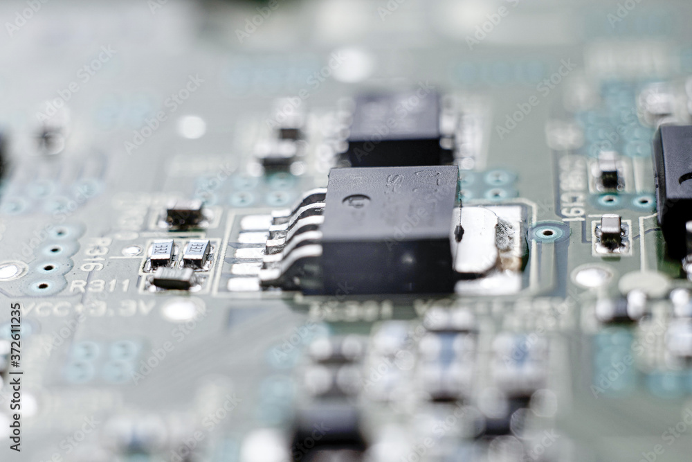 Chip in beautiful blue lighting. Industrial production of circuit boards. Chip in beautiful blue lighting. Industrial production of circuit boards.