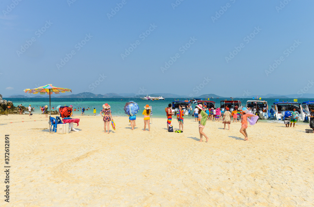 People relaxing, swimming, having fun on the beach. People relaxing, swimming, having fun on the beach.