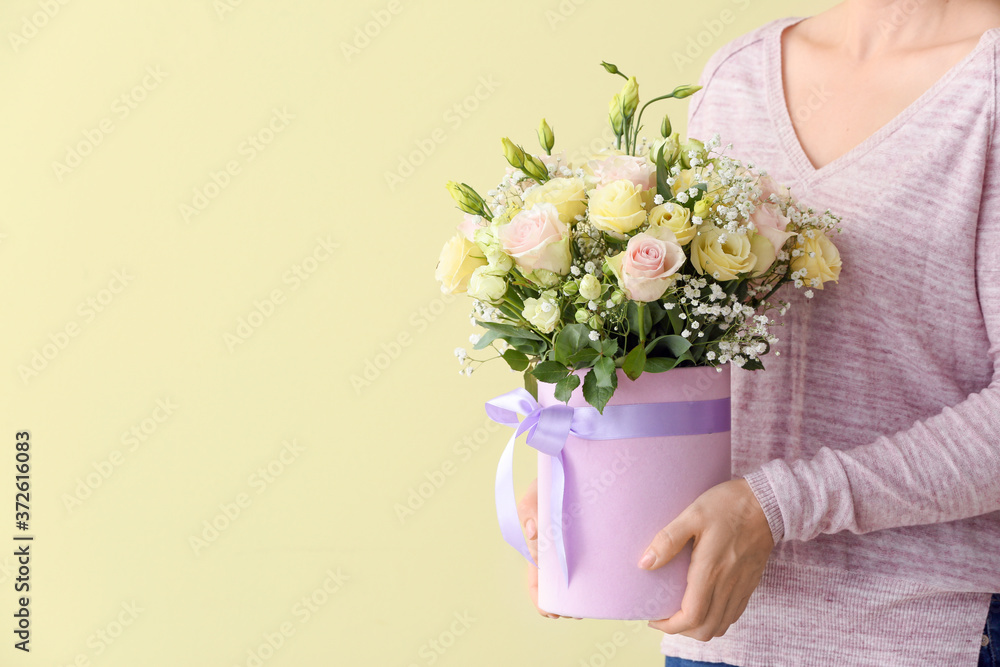 Woman with bouquet of beautiful flowers on color background Woman with bouquet of beautiful flowers on color background
