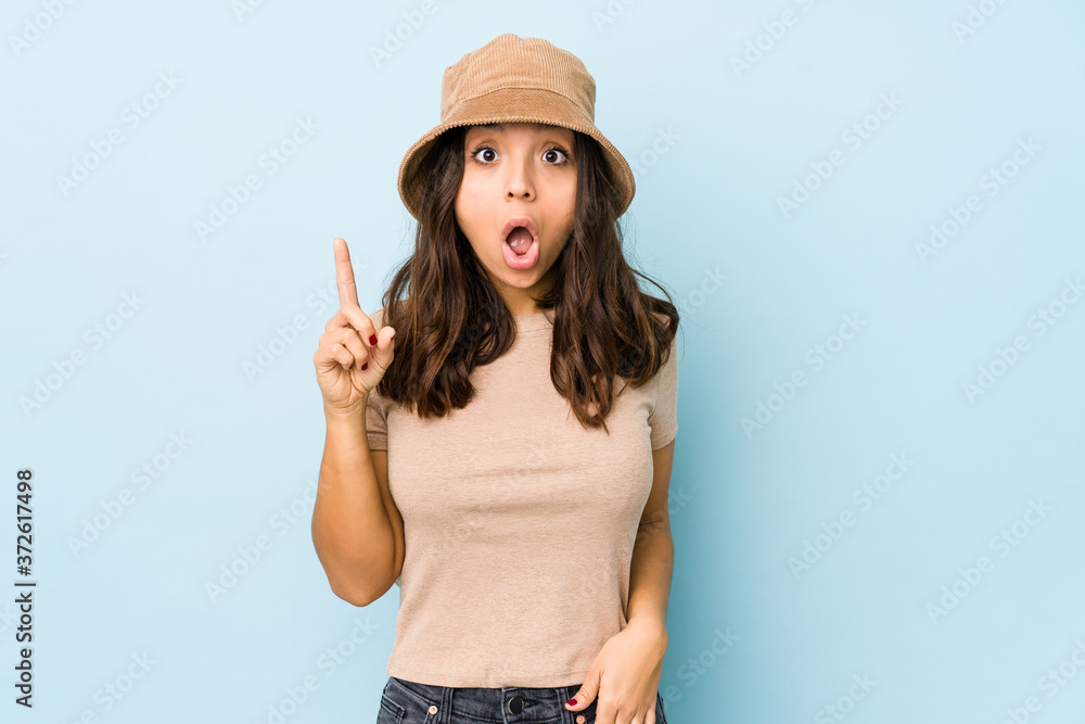 Young mixed race hispanic woman isolated having an idea, inspiration concept. Young mixed race hispanic woman isolated having an idea, inspiration concept.