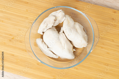 boiled chicken breast on the table closeup