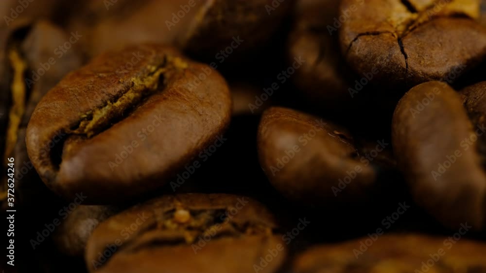 Coffee beans turning super macro background. Coffee beans turning super macro background.