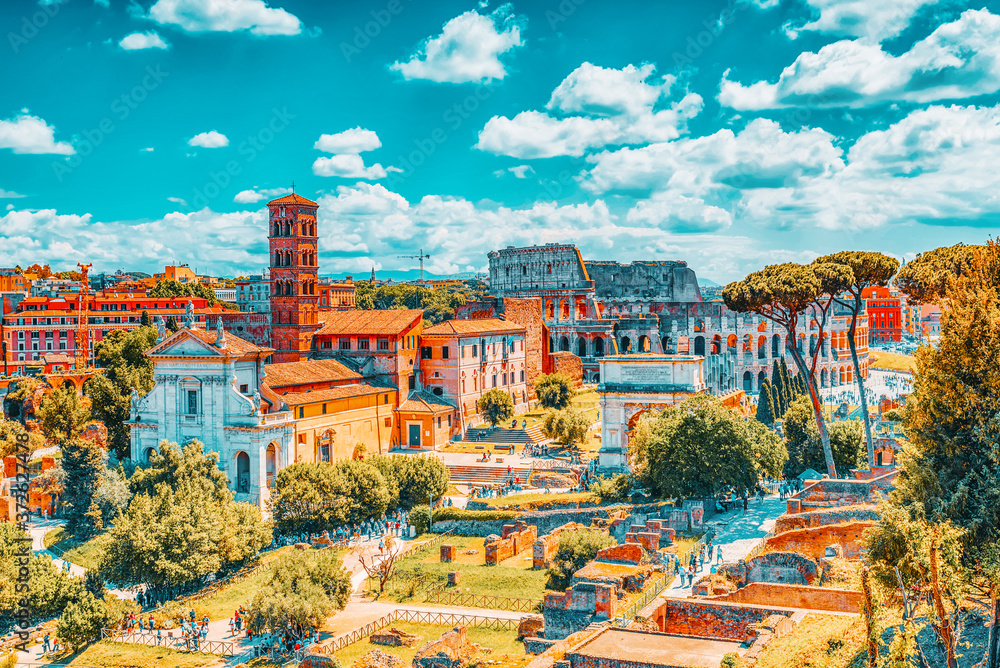 Beautiful landscape of the Colosseum in Rome- one of wonders of the world  in the morning time. View from Roman Forum.