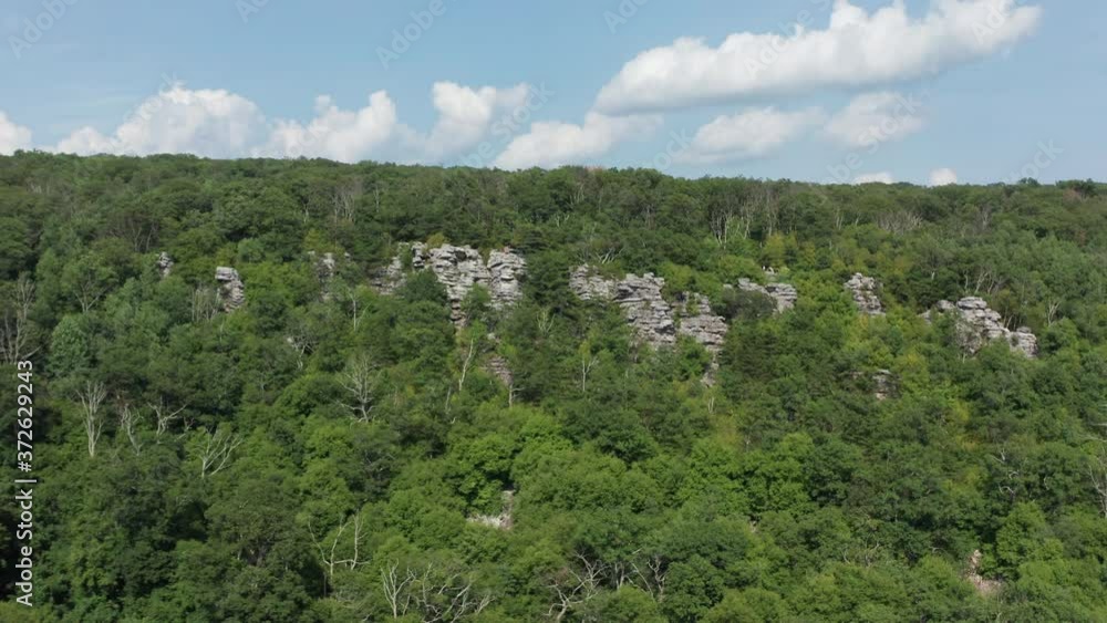 An aerial shot (dolly in, pedestal up) of Annapolis Rock, located in South Mountain State Park in Washington County Maryland. Drone launch, landing and operation conducted outside of National Scenic T An aerial shot (dolly in, pedestal up) of Annapolis Rock, located in South Mountain State Park in Washington County Maryland. Drone launch, landing and operation conducted outside of National Scenic T