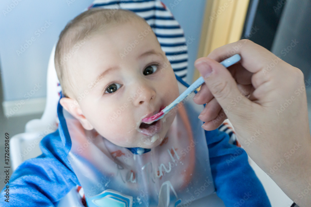 baby having a porridge with little breast baby having a porridge with little breast