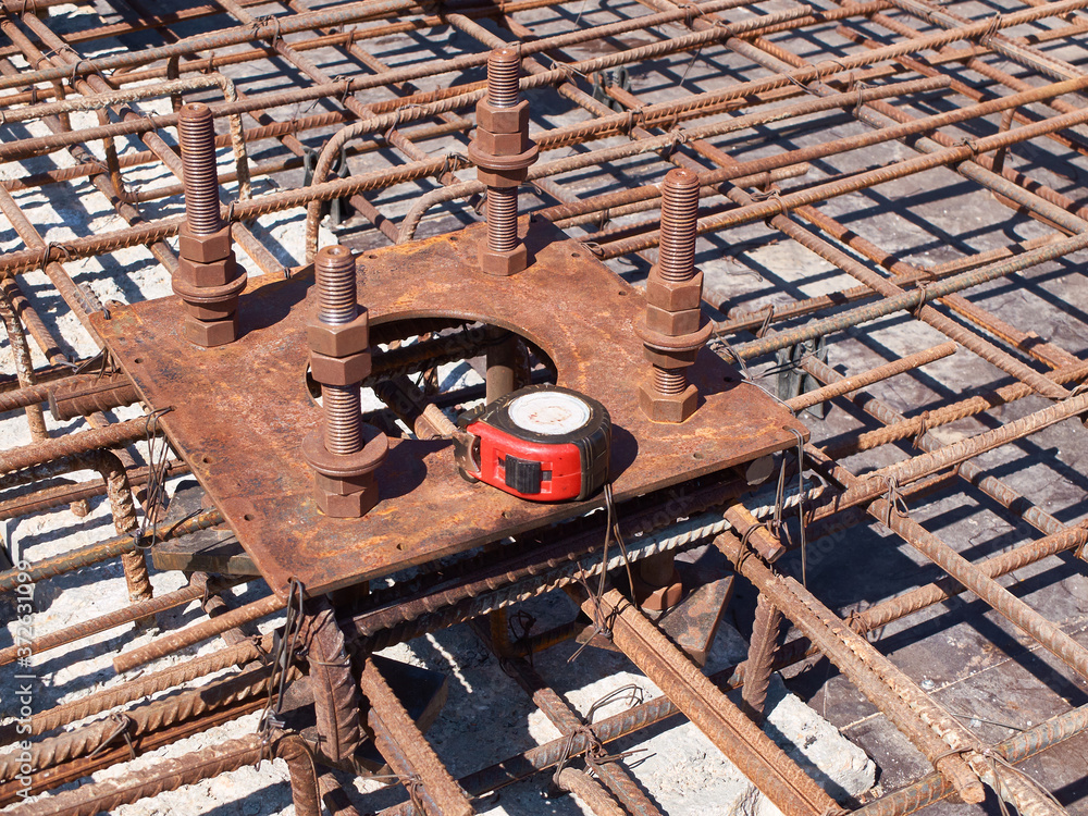 reinforcement of concrete reinforced foundation with metal anchor bolts