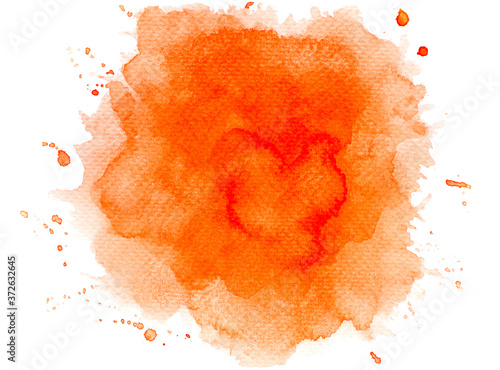 orange watercolor paint of splashes on paper.
