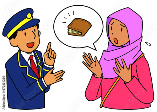 財布を失くしたアジア人女性と駅員