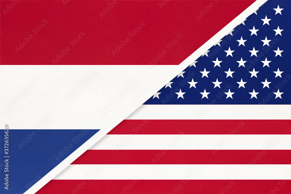 Netherlands or Holland and USA, symbol of national flags from textile. Championship between two countries. Netherlands or Holland and USA, symbol of national flags from textile. Championship between two countries.