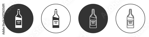 Black Bottle of wine icon isolated on white background. Circle button. Vector.