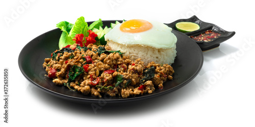 Spicy Chicken  Stir Fried with Basil,chili and Rice ontop Fried Egg