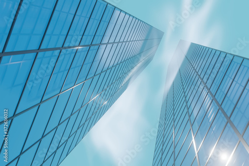 Two mirrored skyscrapers go up into the clouds. 3d render, concept.