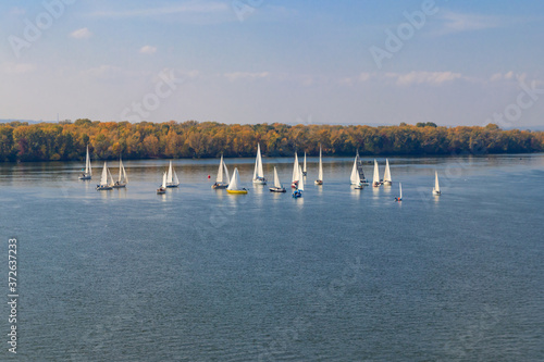 Yachts at sailing regatta on the Dnieper river in Kremenchug, Ukraine