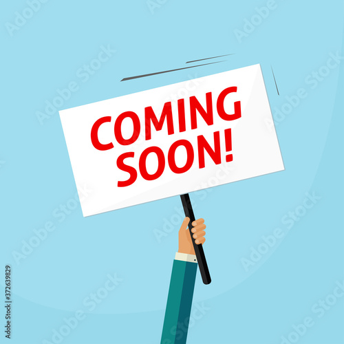 Coming soon placard banner vector poster on person man hand announcement flat cartoon illustration, new product release advertising design concept idea modern