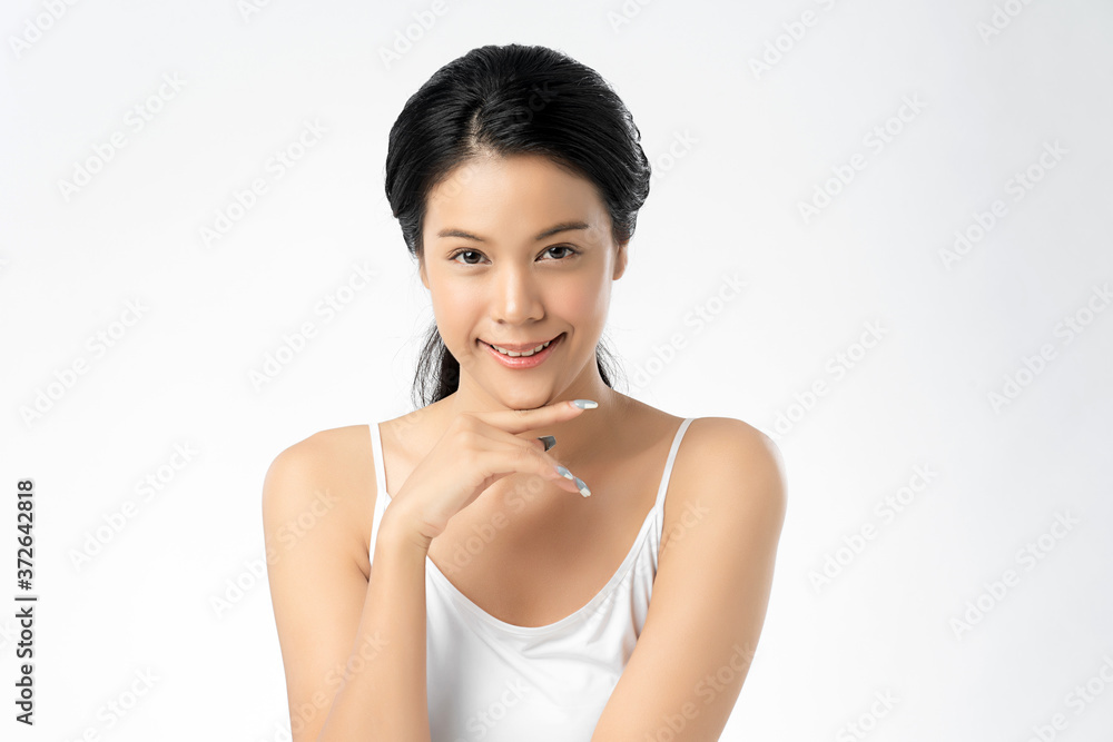 Beautiful Young asian Woman with Clean Fresh Skin, on white background, Face care, Facial treatment, Cosmetology, beauty and spa, Asian women portrait Beautiful Young asian Woman with Clean Fresh Skin, on white background, Face care, Facial treatment, Cosmetology, beauty and spa, Asian women portrait