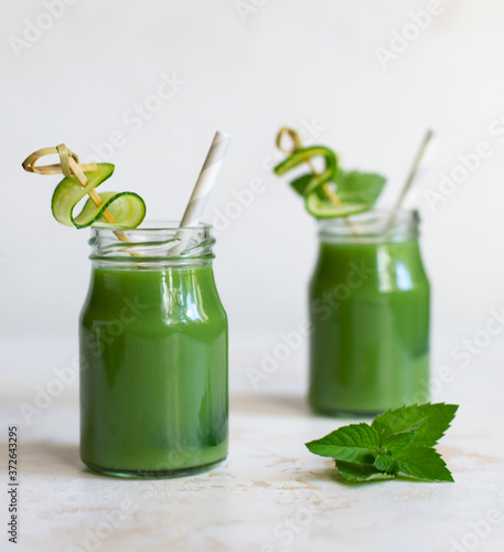 Green smoothie. Glass. The concept of a healthy lifestyle.
