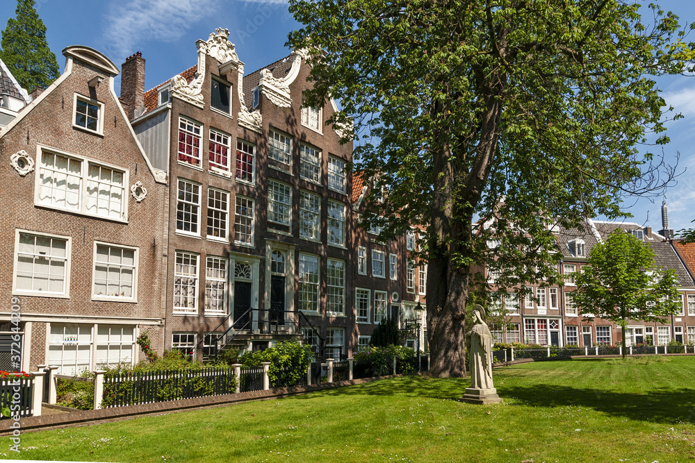 Residential townhouses at in the Begijnhof of Amsterdam, The Netherlands